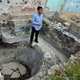 INAH archaeologist Víctor Esperón Calleja stands next to a tannery that was in use during the last century of Spanish rule.